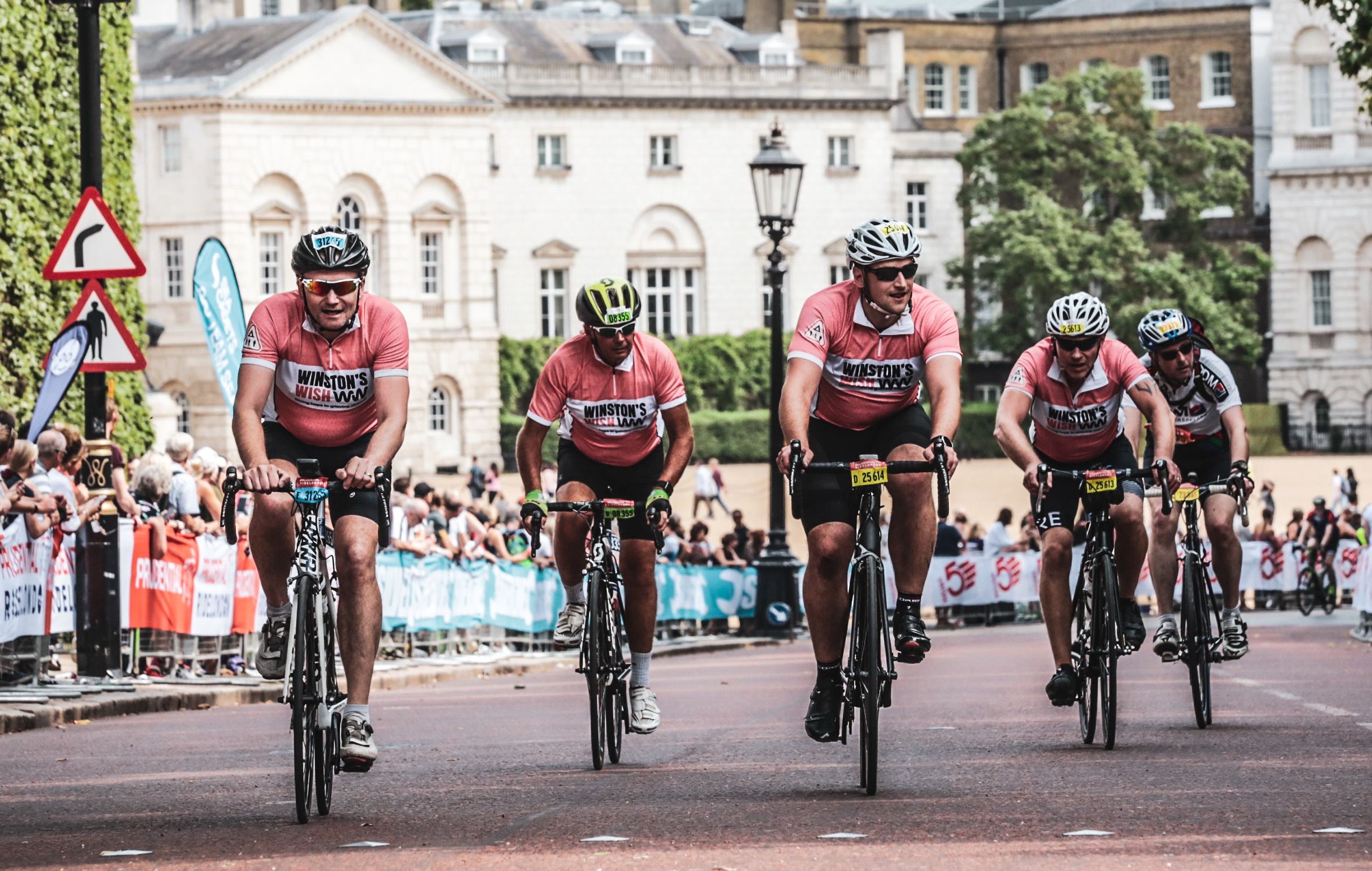 Cyclists in Winston's Wish t-shirts